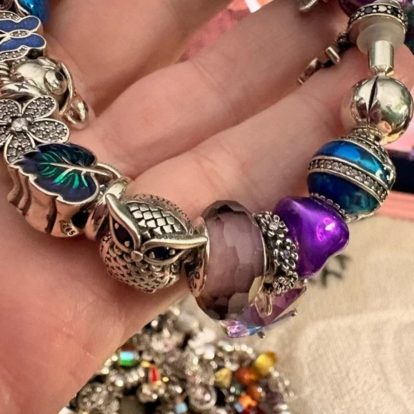 Linx bracelet with owl and butterfly charms